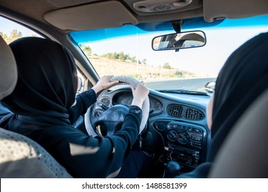 Two Arabic Women Driving While Arguing