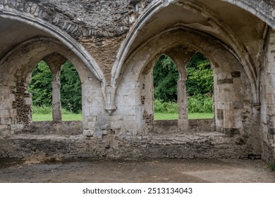 Two arched windows in the Ruins of Waverley Abbey, located near Farnham, Surrey UK. This was the first Cistercian Abbey in England - Powered by Shutterstock