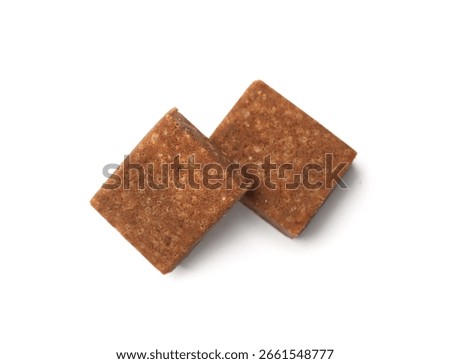 Two aromatic bouillon cubes isolated on white, top view