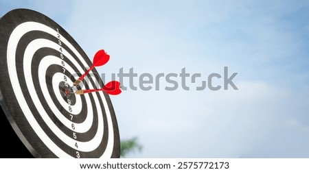 two arrows on target copy space with cloud background