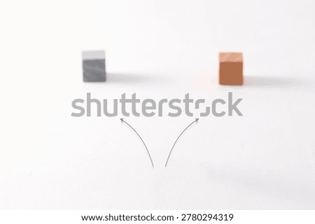 Two arrows pointing to different colored blocks representing choice, alternatives and decision making.