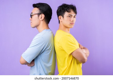 Two Asian Brothers Arguing With Each Other
