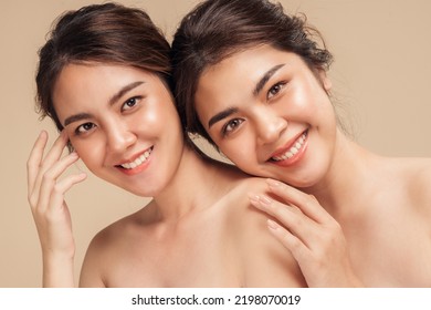 Two Asian female models happy smiling with perfect face skin and natural makeup on beige background. Spa skin care concept. Beautiful woman healthy skin care. - Shutterstock ID 2198070019