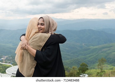 Two Asian Muslim Women Friends Meeting Outside Office.