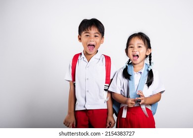 Two Asian Student Kid Girl Boy Schoolchildren Brother Sister Smile Happy Wear Student Thai Uniform Red Pants Skirt In Studio Shot Isolated On White Background, Portrait Little Children Girl Preschool