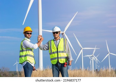 Two Asian Wind Turbine Engineers Shaking Stock Photo 2196837177 ...