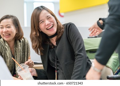 Two Asian Woman Happy With Big Smile In Office