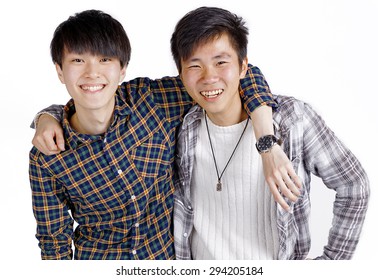 Two Asian Young Casual Men Portrait On White Background