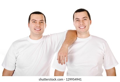 Two Attractive Positive Smiling Young Men Twins Isolated On White