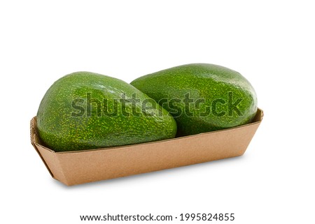 two avocadas in a cardboard bowl on a white background, avocado isolate