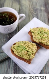 Two Avocado Toast And Lemon Thyme Tea