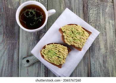 Two Avocado Toast And Lemon Thyme Tea