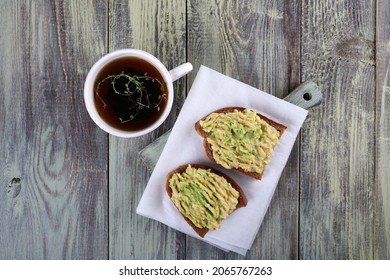 Two Avocado Toast And Lemon Thyme Tea