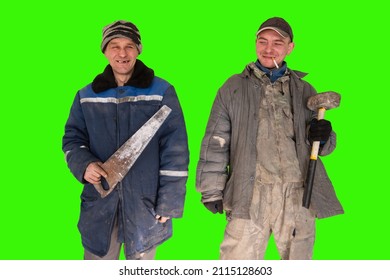 Two bad unskilled builder workers in bad dirty tattered uniform with bad tools. Concept of unskilled workers or crooks or poor quality workers