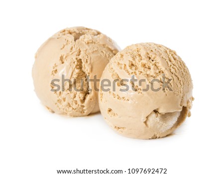 Two ball of ice cream creme brulee isolated on white background.