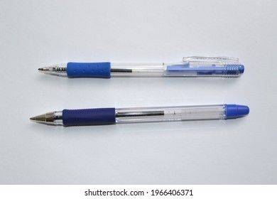 two ballpoint pens isolated on a white background - Shutterstock ID 1966406371