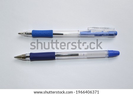 two ballpoint pens isolated on a white background