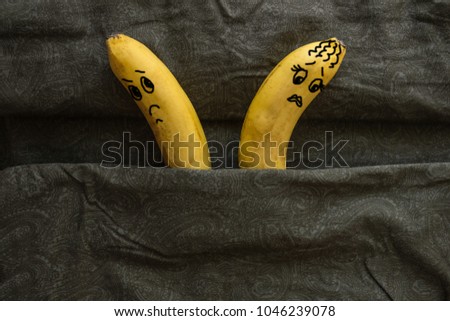 Two bananas in bed, turned in different directions, do not want each other. Coldness, lack of attraction to the husband or wife, sexual disharmony. The picture is made by the author.