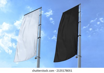 Two banner  flag white and black on blue sky background