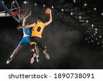 Two basketball players in action in arena. Blocked shot