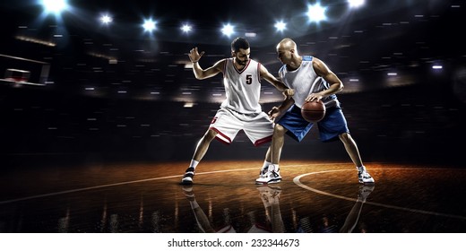 Two Basketball Players In Action In Gym Panorama View