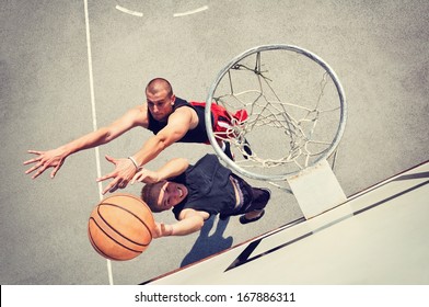 Two basketball players on the court - Powered by Shutterstock