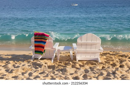 Two Beach Chairs With Mexican Blanket  Near Ocean 