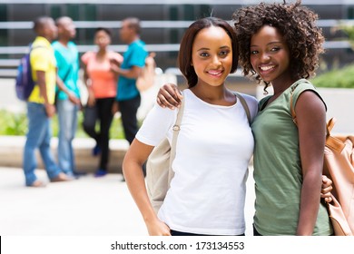 Two Beautiful African American College Friends On Campus