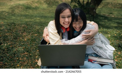 Two Beautiful Asian Best Friends Hugging Each Other With Joy.
Congratulations On Friend's Success, Received Good News, Passed The University Entrance Exam.
Sincerity Concept Of Friendship, Success.