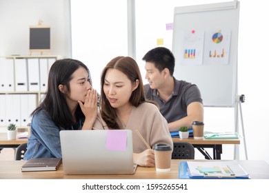 Two Beautiful Asian Women Co-worker Conversation About Office Rumor.