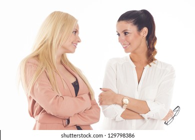 Two beautiful caucasian businesswomen on white isolated background