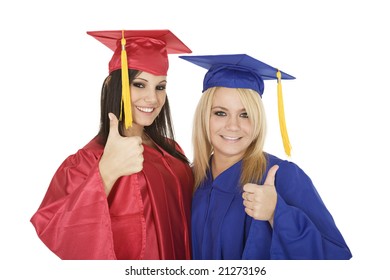 Two beautiful Caucasian girls wearing  gratuation gowns, very happy and excited giving the thumbs up sign, isolated on a white  backgound