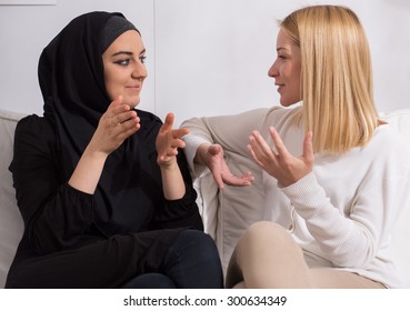 Two Beautiful Girls Of Different Ethnicity Talking