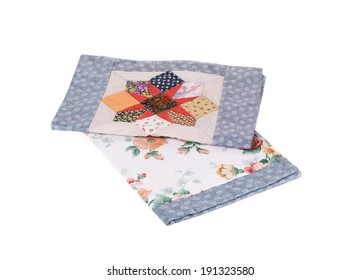 Two Beautiful Handmade Quilts. Isolated On A White Background.