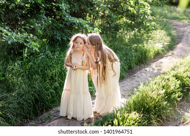 Two Beautiful Little Sisters Secretly Each Stock Photo 1401964751 ...