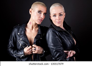 Two Beautiful Women Wearing Black Leather Jacket