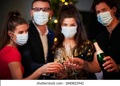 Two Beautiful Young Couples Having Fun At New Year's Eve Party