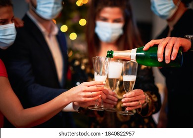 Two Beautiful Young Couples Having Fun At New Year's Eve Party