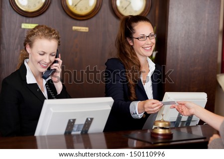 Similar – Image, Stock Photo Young woman in hotel corridor