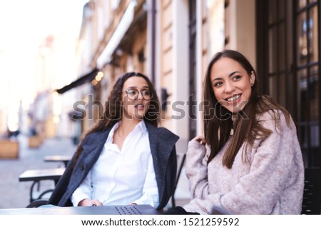 Similar – Image, Stock Photo Twin sisters look around in an alleyway