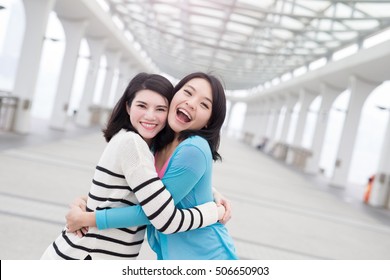 Two Beauty Woman Hug Together In Hongkong