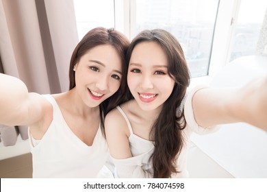 Two Beauty Woman Selfie Happily In The Home