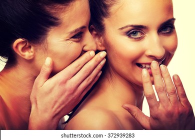 Two Beauty Women Whispering.