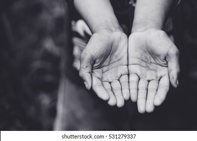 Two Beggar Hands Palms Up.Poor Children Concept.Black And White.donation, Charity, Giving, Poor, Pray, Muslim, Hungry Man, Refugee Day, Foster Kid, Child, Mercy To Human, Hope, Hands Pray, Food Donate