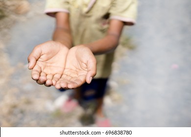 Two beggar hands palms up.Poor children and Poor people Concept.