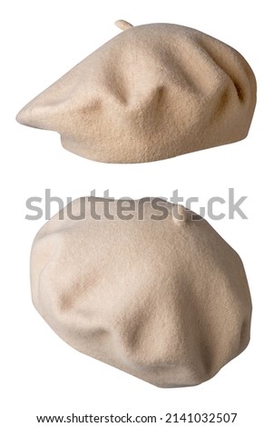 two beige beret isolated on white background. Hat female beret front view .