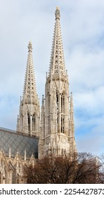 The two bell towers of the Neo-gothic Votive Church in Vienna, Austria - Shutterstock ID 2254427873
