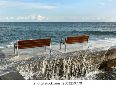 Two benches on coast of Mediterranean sea. - Powered by Shutterstock