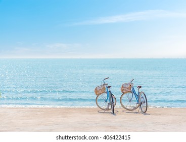 Two bicycle at the beach on blue sky - Powered by Shutterstock