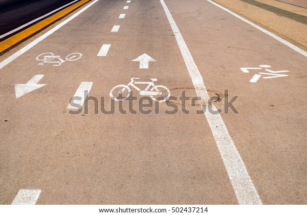 Two\
Bicycle Lanes and a Runners Lane beside the\
Highway